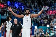 米兰体育-人击败热火，恩比德大号两双引领球队胜利